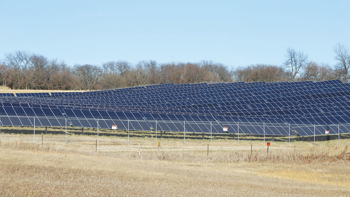 Solar panels cover a field in western Iowa